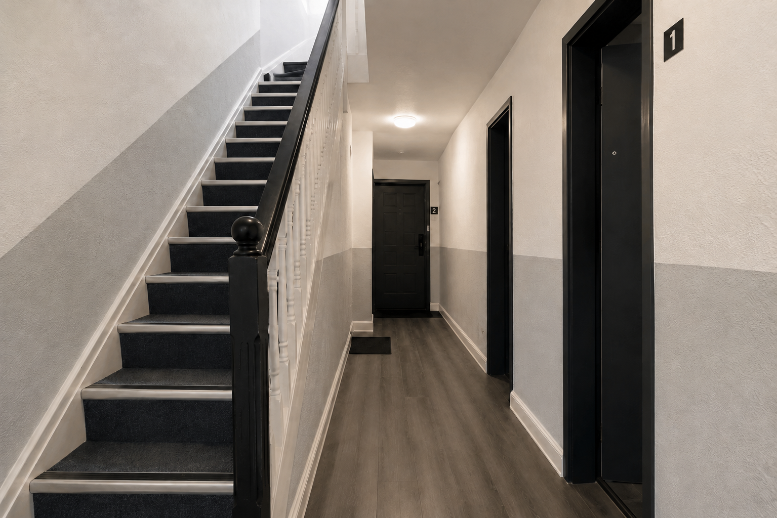 communal cleaning photo: cleaner mopping a shared stairwell or hallway in a Portsmouth HMO or apartment building